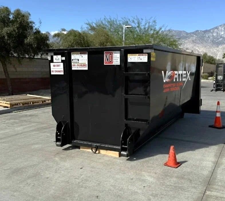 Loaded dumpster awaiting pickup